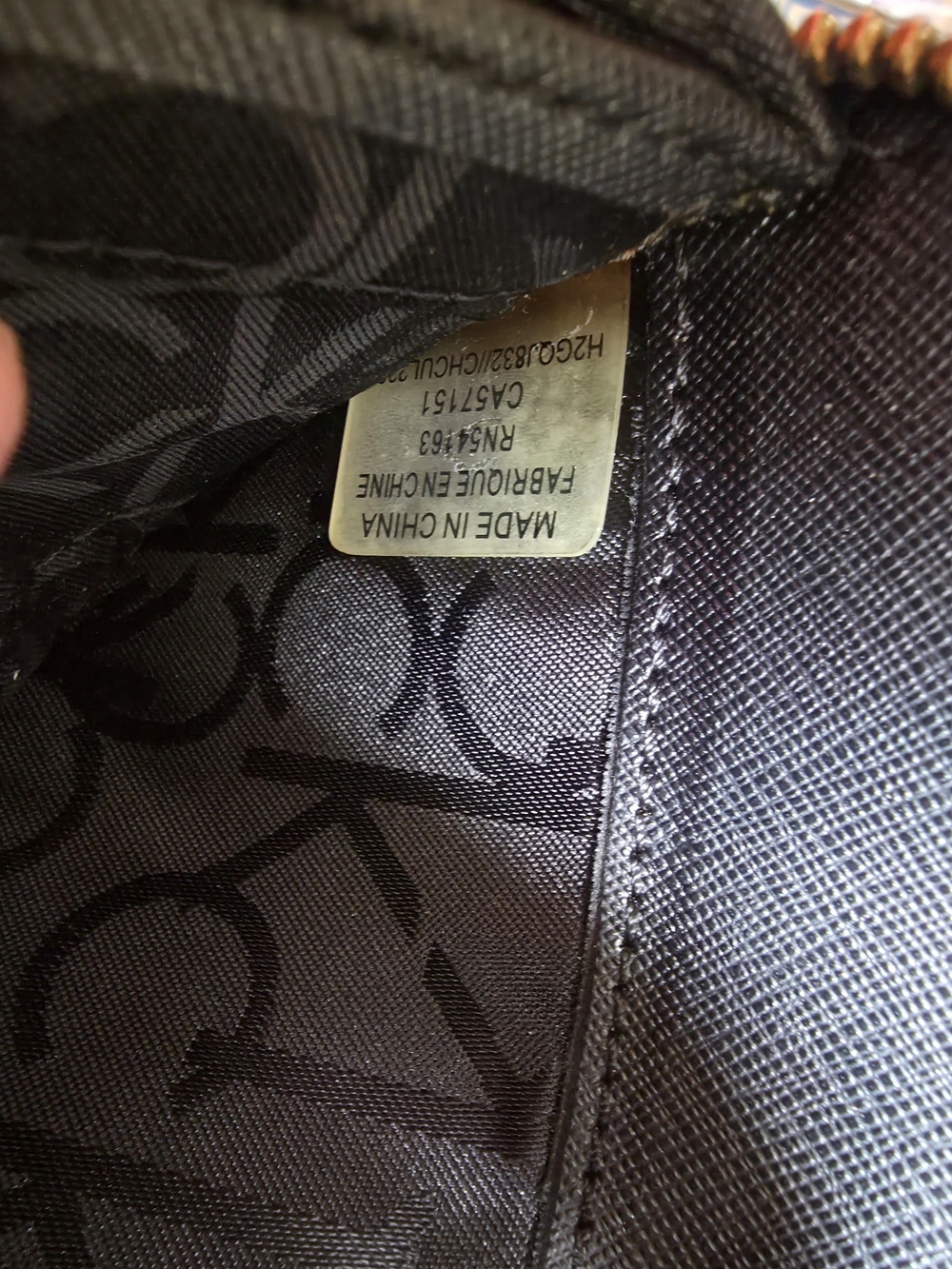 Calvin Klein Signature Zip Monogram Wallet - Picture 10 of 10